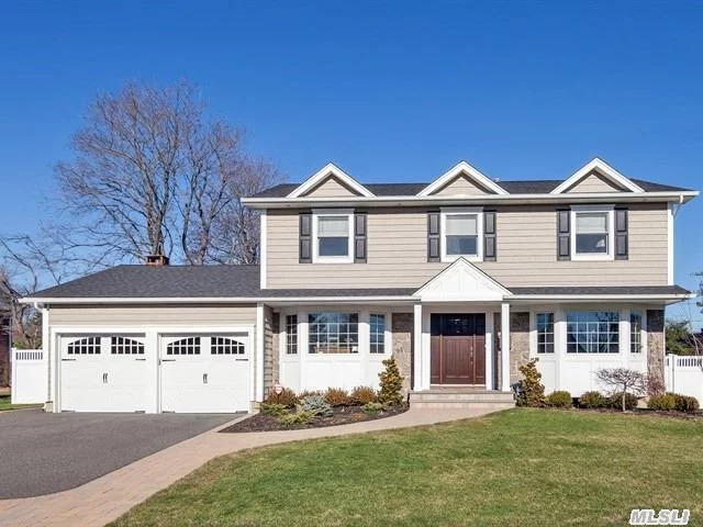 Light, Bright & Elegant 4 Bedroom, 2.5 Bath Renovated & Expanded Colonial Home In The Heart Of West Birchwood, Features A Gourmet Eat-In-Kitchen W/Granite Countertops, Den W/Fireplace, Large Living Room. New Roof, Driveway, Siding, Garage Doors, Hot Water Heater, Washer/Dryer And 200Amp Elec Service. Hardwood Floors Throughout & A Full Finished Basement.