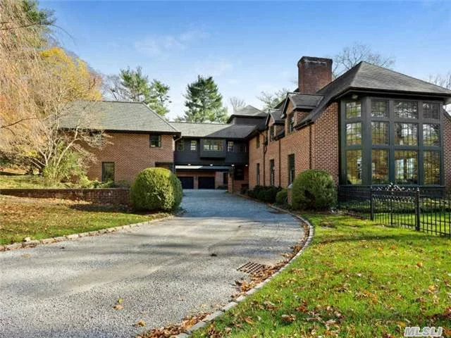 This Quintessential Country Manor Home Was Designed By A Noted Architect. The Main House Connects To A Separate Wing By An Elegant Overhead Walkway. Situated On 3.8 Acres. This Home Features 6 Br, 6.55 Baths, Fdr, Gourmet Kit , Outdoors Offers A Large Patio Along Side An In Ground Pool. Three Car Garage & Award Winning Jericho School District. 25 Miles From Manhattan.