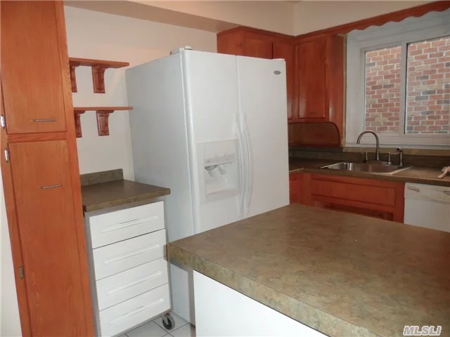 Lovely 3 Bedroom First Floor Apt.With New Bath. Close To Lirr - Buses To City Or Main St. - 2 Blocks To North Shore Farms. Heat Included. Parking In Driveway Included. Use Of Laundry Facilities Included As Well As Shared Use Of Backyard.