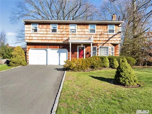 Charming Colonial Near The Water On A Private Cul-De-Sac. This Expansive Home Features Gleaming Hardwood Floors, Spacious Sun-Drenched Rooms, Two Master Suites Both With En Suite Bathrooms, Private Fenced Yard And More. All That Awaits This Home Are Your Finishing Touches.