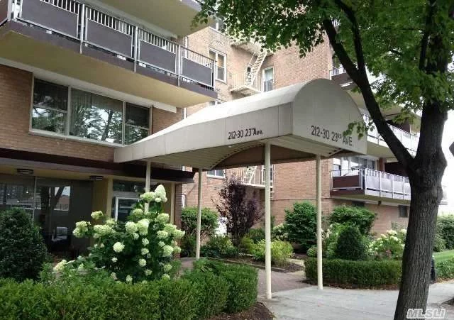 Desirable Bay Terrace Section 12 - Large One Bedroom- Updated Eik & Bath - Wood Floors - Central Air - L/R - D/R - Large Closets Including Walk In - Walk To Shopping Center - And To All Buses - Min. To Parkways & Bridges - Maintenance Includes G & E, C/A And Pool - Parking Available 47.00 Outdoor Spot - 417 Shares