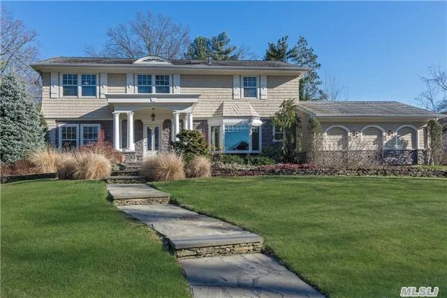 Stunning Plandome Manor Water View Colonial W Gorgeous Curb Appeal, Perfectly Situated On A .48 Acre Lot. Private Park & Beach Access Across The Street. Flr, Fdr, Eik W Granite Counter Tops & Yard Access. Den W Fpl, Powder, Laundry & Foyer. 2nd Fl Boasts A Mstr Suite, 4 Addl Bdrms & Full Bth W Skylight. Deck, 2 Car Att Garage, Cac, Alarm, Ig Sprinklers. Low Taxes. Sd #6.