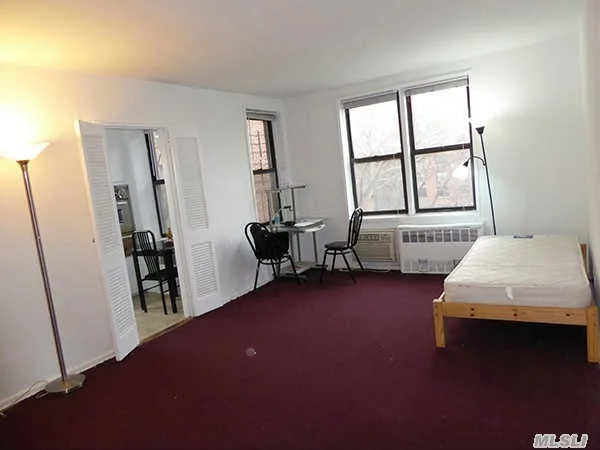 Bright And Sunny, Huge Studio Condo, Low Common Charges (Includes Heat, Cooking Gas, Hot Water). High Ceilings, With Four Windows Eastern Exposure. Excellent Starter Property For Investment (No Renting Restrictions). Well Maintained Condo With Doorman, Elevator, Live In Super, Bus Stop And Subway On Corner And Close To All Shopping Area & Restaurants.