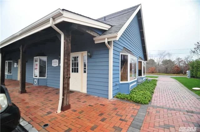 Charming Shopping Mall In The Middle Of Southold Hamlet. This Space Is Directly Accessible And Visible From Side Road Of Shopping Center. Lovely Post And Beam Design With 750 Sq.Ft And First Level And 600 Sq.Ft On Second Level Loft And Generous Basement Storage Area. Can Accommodate Numerous Business Types - Some Competitive Restrictions.