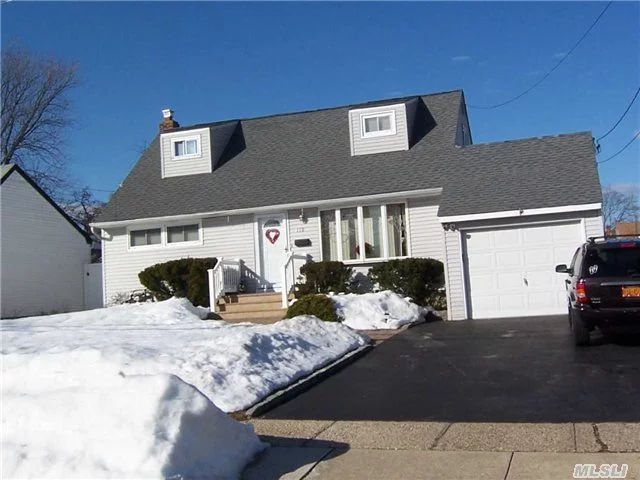 Nice Clean Updated Cape.New Tile, Hot Water Heater, Washer/Dryer, 200Amp Electric, Split A/C Unit Upstairs.Updated Roof, Windowa And Siding.4 Ceiling Fans, Oversided Blacktop Driveway.