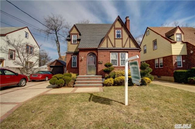 Vintage Tudor Totally Updated Thru Out!....Lg Upd Eik W Granite Counter Tops, Huge Fdr! Red Oak Floors, Upd Windows, Roof & Electric! Huge Famrm, Lg Finished Basement! Multi Fireplaces And Skylites! This Charming Home Is In Mint Condition ..Must See!  Truly One Of A Kind !