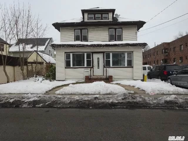Legal 2 Family In 5 Towns Cedarhurst Area. 4 Bedrooms, 2 Full Baths,  Large Spacious Rooms, With Full High Ceiling Basement, Enter Into A Hugh Enclosed Porch , 2nd Floor Apartment Has Assess To Attic, 2 Separate Boilers, Long Private Driveway, Near All, Must See!