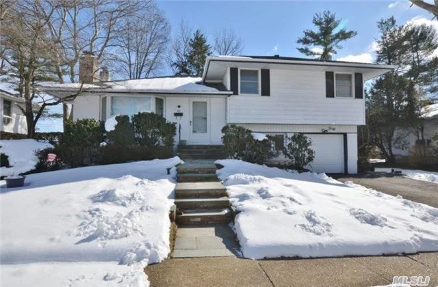 Sunny-Side-Up 3 Bedroom Split: Open And Bright L-Shaped Lr/Dr W/Fpl Eat In Kitchen Family Den W/ Glass Sliders To Deck & Back Yard   Landscaped 72 X 104 Mid Block Location Jericho School Dist.!!