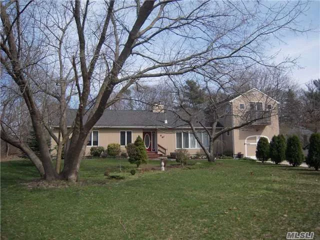 This Beautiful Ranch Home Features Living Room With Wood Stove, Formal Dining Room With Fireplace, Eat-In Kitchen, Family Room, Game Room, Master Bedroom With En-Suite, 2 Guest Bedrooms & Guest Bath. Extras Include: Hardwood Floors, Cac, Igss & Spacious Deck For Entertaining.