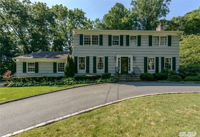 Fabulous 5 Bedroom Colonial Completely Updated With New Gourmet Eat In Kitchen Overlooking 2 Landscaped Acres With Fieldstone Retaining Walls, Boxwood Garden With Fountain, Two Terraces With A Fountain, Hardwood Floors Throughout, Generator Services The Entire House.