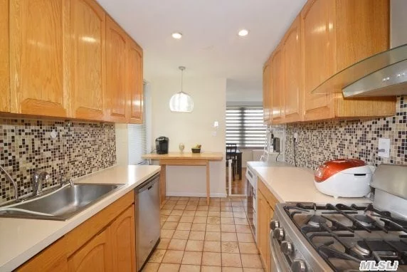 Extra Large 1250 Sq. Ft. Corner 2 Bedroom With 2 Full Baths Located In The Heart Of Bay Terrace.- Updated Throughout With Gleaming Hardwood Floors, Crown Moldings, Hi-Hats. Central Air/Heat ; Also Includes Parking Ownership. Minutes To The Lirr; Qm2 To City Close- Walk To Bay Terrace Shopping Center.