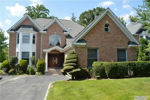 15 Yr Young Brick Colonial. Over Sized Property. High Ceilings, Open Floor Plan, Huge Bedroom Off Master Suite, Gazebo In The Backyard.