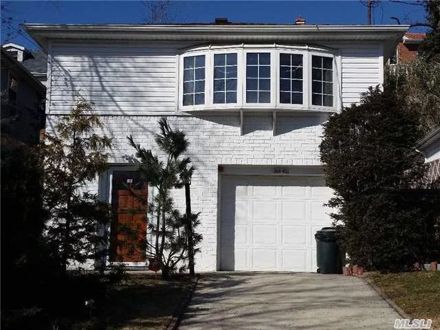 Hi Ranch Home In Little Neck Hills. New Cac/ Heating, 3 Years New Roof, 3 Bedrooms, 2 Full Baths, 1 Attached Garage, Big Tiled Floor Family Room On Ground Floor, Sd#26, Convenient Location, Ps# 94, Jhs #67, Cardozo Hs. Qm3 To Midtown, Q12 To Flushing, Lirr To Penn Station.