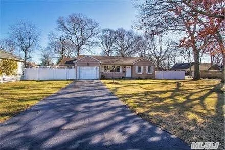 Open Concept 4 Br W/ Soaring Vaulted Ceiling & Warm Oak Floors Throughout.Fully Pvc Fenced Yard, New 200 Amp Electric, Enormous Basement, Covered Deck Off Sunlit Breakfast Room, Freshly Painted, Full Attic W/ Pull Down Stair, Extra Driveway For Vehicle Storage, Walk To Charming Village And Close To Beaches, Easy Ranch Style Living At Its&rsquo; Finest And Not In A Flood Zone!