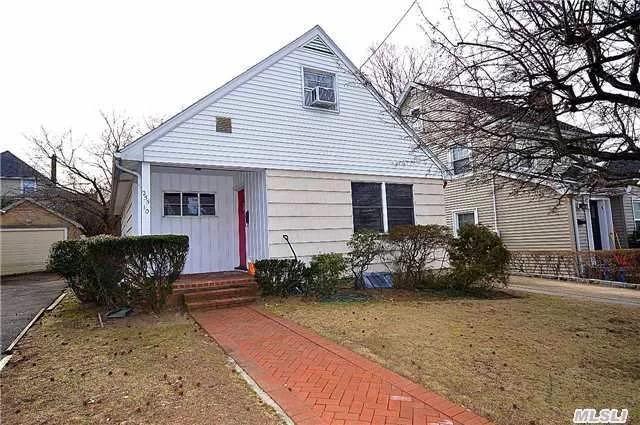 Cozy Cape Cod Home, 3 Bedroom, 2 Bath, Amazing Location, Quiet Block, Close To All Transporations, Shopping, Parks,  Great Neck South Schoosl, Hardwood Floors, Gas Heating,  Automatic Door Opener, New Roof , New Brick Patio,