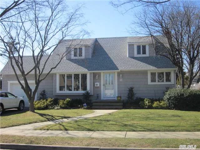 Wonderful Rear-Dormered Westwood Cape. Expanded, Bright Kitchen With Sliders To Large Yard. All Appliances Recently Updated. Can Be 3 Or 4 Bedrooms, 4th Bdrm Currently Is A Den/Playroom. 2nd Floor Bdrms Are Large With Sitting/Office Areas. Plus 2nd Fl Full Bath Has Adjoining Closet/Dressing Rm. 2-Car Driveway, Gas Stove And Gas Dryer, Security System.