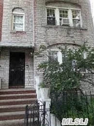 2 Family House In The E.Elmhurst Area. 15 Rooms With 5 Bedrooms, 2 Full Bath With A Full Finished Basement. Close To All.