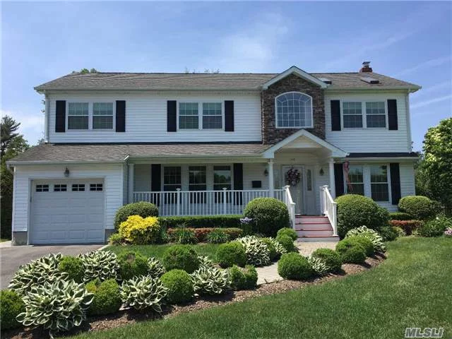 Stunning Colonial In N. Syosset W/Great Curb Appeal. Beautifully Updated Throughout-From The Granite Stainless Steel Appliance Kitchen To Pristine Marble Baths. Large Master Suite W/Tray Ceiling & Master Bath With Walk In Closets. All New Windows, Patio, Driveway..Too Much To List. Walk-Out Basement With Office/Additional Bedrm & Bath.Fenced Yard. Berry Hill Elementary!