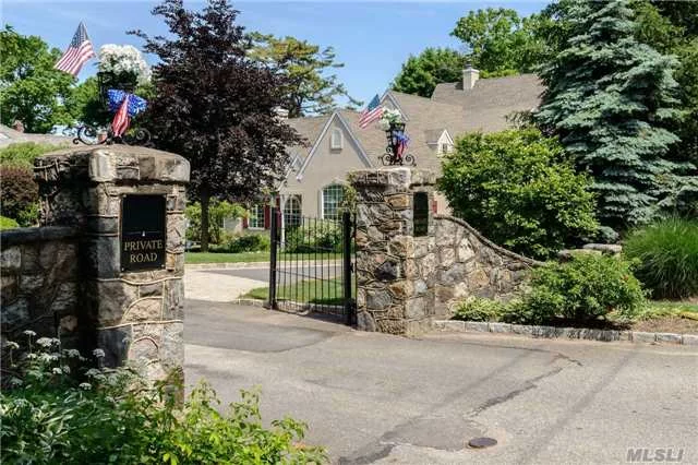 Custom Built French Colonial Situated On Exquisitely Landscaped .36 Acre On Private Rd In Plandome. Steps To Manhasset Bay. Dock And Mooring Availability.