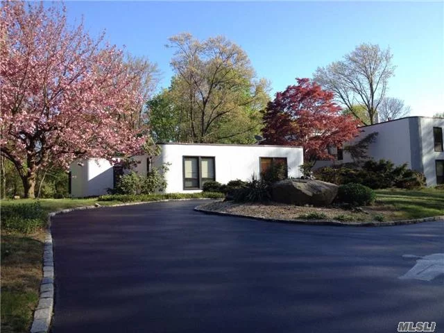 Striking 5 Bedroom, 3.5 Bath 4685Sf Contemp. Home Approached By A Winding Driveway & Sited Atop A Hill Offering Seasonal Water Views. Wonderful Open Floor Plan, Generously Scaled Rooms & Walls Of Windows. 2.13 Gorgeous Acres. Home Easily Accommodates Mother-Daughter Or In-Law Configuration. Incredible Value.