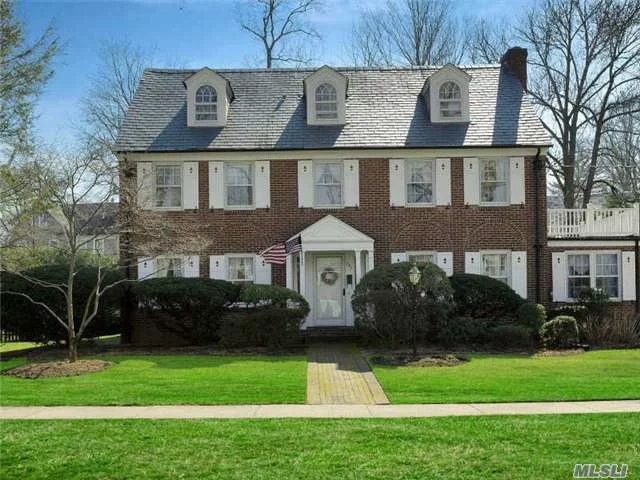 Classic Brick 7 Bedroom Center Hall Colonial Located In The Heart Of Munsey Park Offers Spacious Entertaining Rooms And Beautiful Architectural Details Through Out.