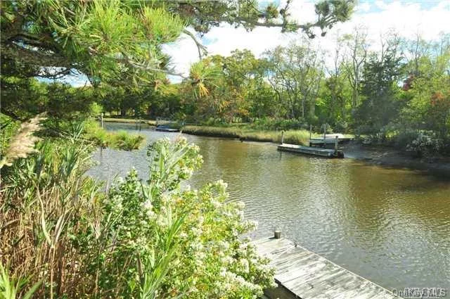 This Is Your Chance To Get A Waterfront Home At A Great Value! 100 Feet Of Waterfront, With Dock For Small Outboard Boat, Canoes And Kayaks. Ranch With L-Shaped Living And Dining Room, Large Kitchen, Master Suite - Three Bedrooms, Two Baths In All. Large Deck, Deep Back Yard, Garage And Full Basement. New To The Market!