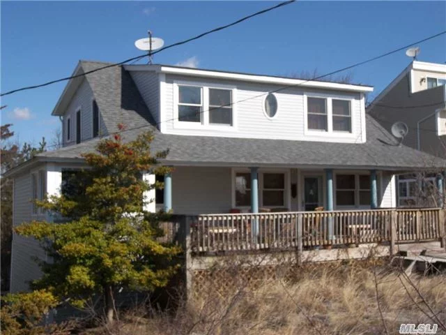 This Home Is Located On A Boardwalk That Leads To A Sandy Beach! This Home Is Decorated With Some Of The Finest Stone Specimens Available. The Master Bath Is Sumptuous And The Huge Master Bedroom Has Plenty Of Closets And Room For A Large Sitting Area. The 3 Full Baths Are Exquisite! Lots Of Decking For Entertaining And Relaxing To The Ocean Waves!