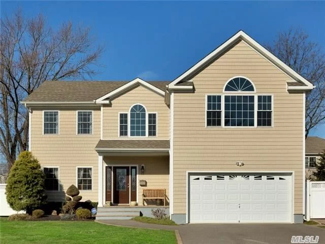 StunningBetter Than New 2010 New Construction!3000 Sq Ft Side Hall Colonial W/4 Bdrms, 3 Fbths & 2 Car Gar, Mid Blk Loc!Bright, Spacious Open Layout, Superb Finishes &Attention To Detail!Dbl Hgt Entry, Lvrm, Fdrm, Eik W/Isl & New Appl, Fam Rm W/Fpl, Fbth.Master Ste W/Lux Bth, Custom Closets &3 Bdrms, Fbth, Lndry.Beautifully Landscaped Pvc Fenced-In Yard W/Patio!Alarm!Many Upgrades!