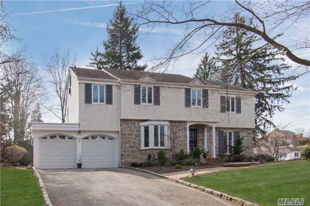 Elegant Sundrenched 4Br Colonial! Stone With Marblelized Stucco Exterior. Well Designed Spacious Layout! Beautiful Property!Plus...2 Car Garage And Full Basement!