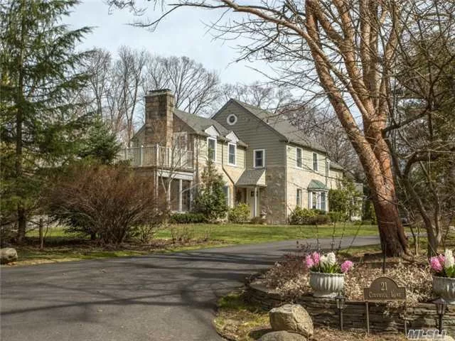 Colonial Set On One-Acre Flat Parcel. This Elegant And Traditional Residence Offers Spacious, Sun-Drenched Principle Rooms. Living Room With Fireplace, Formal Dining Room, Kitchen + Breakfast Room, 4 Br, + 4 Full Baths, (One Br On 1st Floor Can Be Used As Family Room), Mud Room, Pantry, Walk-Up Attic, 2-Car Garage, Bluestone Patio + Screened Porch Overlooking Property.