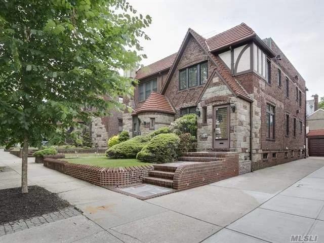 Stunning Gross Morton Tudor In Bayside Hills. 3 Bedrooms, 3.5 Bathrooms. Sunken Living Room, Fireplace, Formal Dining Room, Renovated Eat-In-Kitchen, Sunroom W/Half Bath & Doors To Rear Deck. Hardwood Floors Throughout. Spacious Bedrooms. Master With Private Bath. Finished Basement/Family Room, Full Bath, Separate Laundry. Cac. Gas Heat. Driveway. Garage. Sd 26, Ps203.