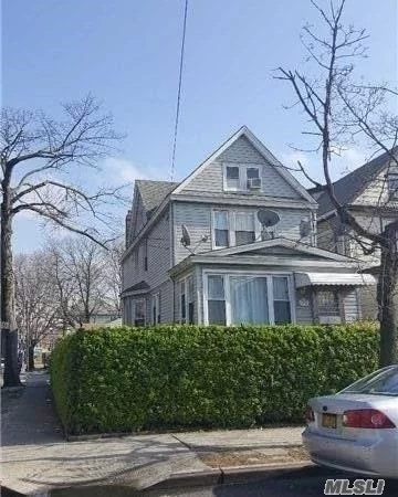 Magnificent 2 Family In The Heart Of Elmhurst Use As One Family. Prime Location, Corner Property Near Shopping And Transportation. Completely Renovated With Large Living Room, Eat In Kitchen, 8 Bdrm, 21/2 Bath, Parquet Floors, 4 Car Garage, Etc.. One Block From Broadway, Two Block From Subway.