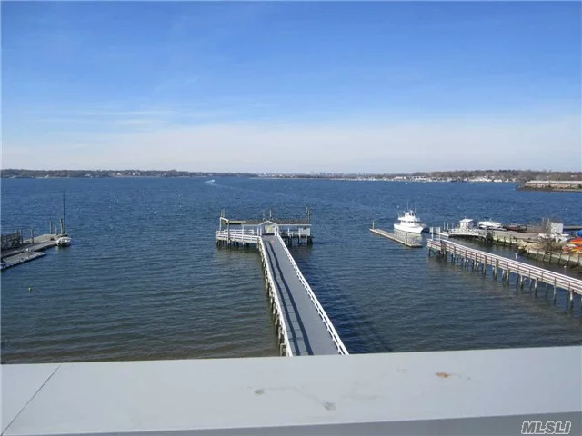 New Waterfront Condo Completed In 2015 With Top Of The Line Construction Offers Fabulous Views Of Manhasset Bay, Sunsets, And Manhattan Skyline. Luxury Waterfront Community For 62+ In The Hear Of Town On The Harbor Features State Of The Art Video Doorman, Fitness Center, Roof Top Terrace With Bbq, Dining, Seating, Putting Green, Private Dock, Assigned Garage Parking.