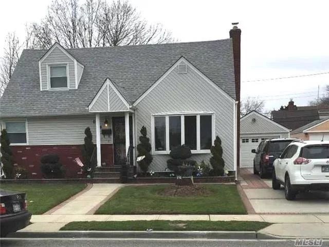Well Maintained Cape, Boasts Hardwood Floors Throughout, Withholds 4 Large Bedrooms, 2 Bathrooms, Eat-In Kitchen, Dining Room & Living Room, Basement, Updated Driveway. Minutes From Southern State, Close To Transportation & Stores. Move-In Ready.