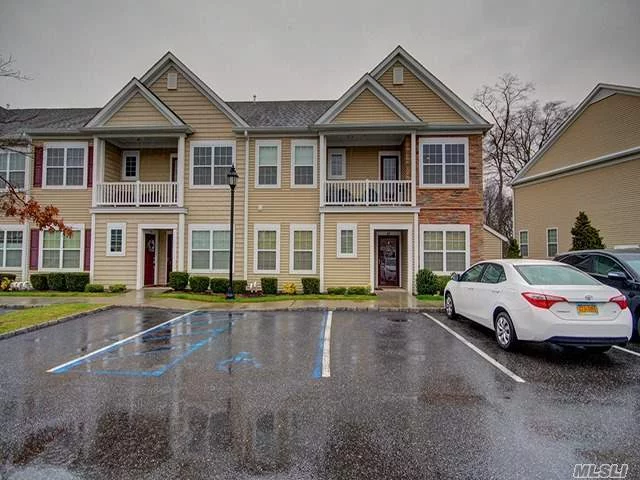 Immaculate Corner 2nd Floor Unit That Backs The Woods. Beautifully Painted. Hard Wood Floors, Carpet In Bedroom W/Brand New Carpet In Second Bedroom. Granite Counters, Ceramic Back Splash, Lights Under Cabinets. Ceiling Fans. Surround Sound In Living Room. Brand New Washer.