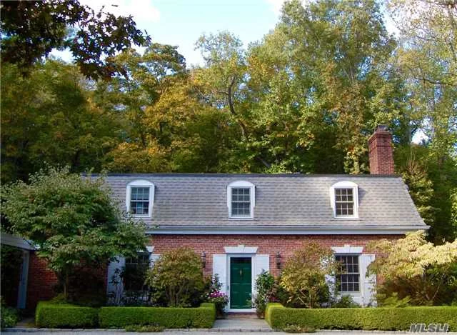 Charming French Style Brick Col On 2.6 Secluded Acres W/ Specimen Trees. Courtyard Entry, Beautifully Planted Property, Fishpond With Waterfall. Lovely Entertaining Rooms Open Onto Brick Walled Terrace. 4 Fpls, Slate And H/W Floors, Master Suite Plus 4 Br&rsquo;s. Generator.