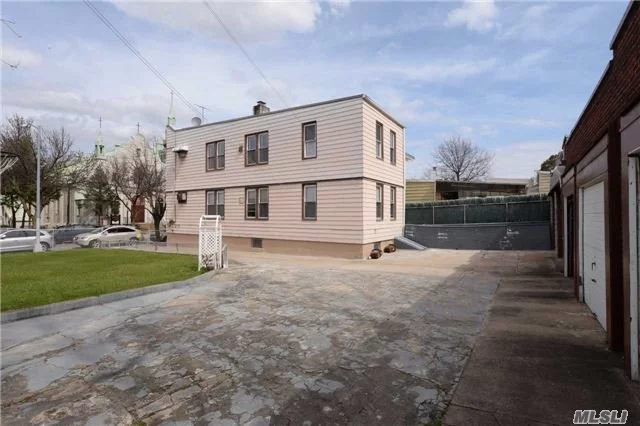 Vacant Land In Maspeth On 40X100 Lot, With Next Door 2 Family House On 23X100 Lot,  Total 63X100. 6 Garages In The Back. Zoning R4-1. Ideal For Multifamily Development Site.