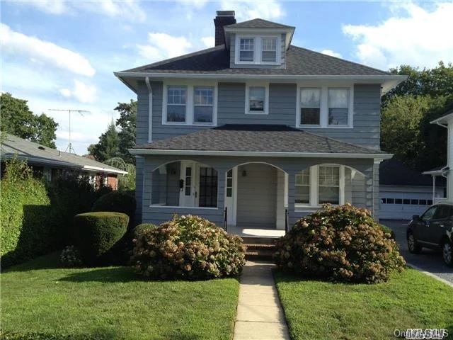 Old World Charm Abounds In This Lovely And Spacious Colonial, Featuring Gorgeous Hw Floors And Beautiful Traditional Touches Throughout. New Kitchen Cabinets W/Granite Countertops And New Porcelain Flooring, Huge Yard, 2 Car Garage, And Granny Porch Complete This Beauty.