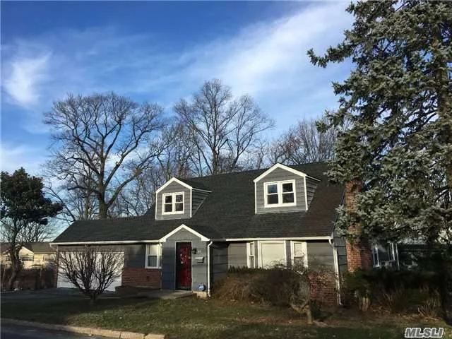 Beautiful 4 Bedroom, 2.5 Bath House, Completely Redone! Living Room With Fireplace, New Kitchen With Granite Counter Tops & Stain Less Steal Appliances, New Washer & Dryer, High Hats& Acs. New, Hardwood Floors, Heating System And Gas Generator. Just Finished Basement With Wet Bar Half Bath And Office! Close To Public Transportation & Highways.Must See!!