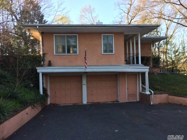 Repair And Renovate Or Raze And Build Your Dream Home. High Elev, Generous Building Envelope, View Of Pond, 1 Block From Lirr, Plandome Country Club, Beach Association: Plandome Field & Marine Club W Beach, Tennis & Mooring Rights. 20 Foot Rear And Side Yard Setbacks. Architect And Local Zoning Expert Available.