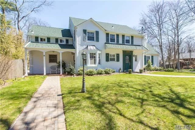 Turn Of Century 1889 Elegant Living At Its Best! 5 Bdr 3.5 Bth Colonial Includes A Separate Legal 1 Bdr Apt By Co. Oak Lined Kit W/ Brfst Rm Opening To Cozy Den, Hw Flrs, Flr W/Fp, New Roof, Elec, Windows & Insulation, Porch W/Hot Tub, Mstr Suite W/Updated Bth, Full Basement Partly Finished,  Huge 2 Car Det Gar, All Nestled On Over ? Acre Across From Brook Ward Hall Park