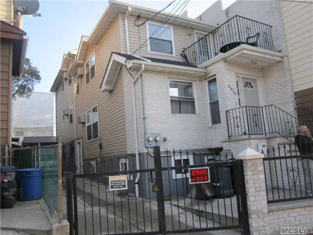 10 Years Old 2 Family House, Very Good Condition, S/D, Long Pvt, 2 Boilers, 1 Car Garage. Duplex Of 4 Bedrooms Plus A 2 Bedroom Apt On Top. 5 Heating Zones. Convenient To Fresh Pond Rd, Flushing Ave, Ps 153.