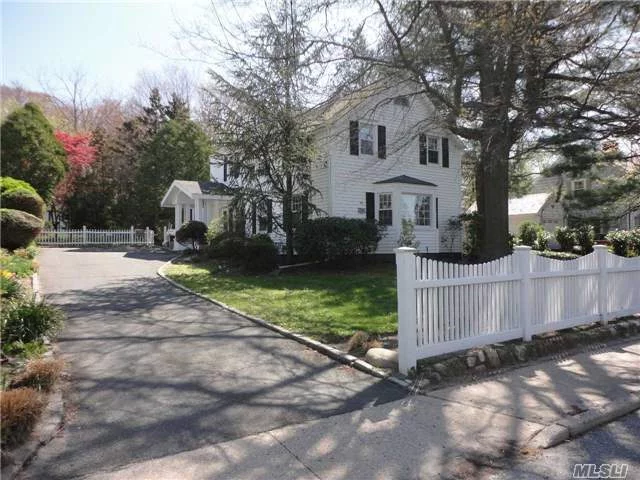 Just Listed And Move In Ready! Sweet & Charming Vintage Colonial Home On Large Beautiful Private Property Just One Block From The Water.