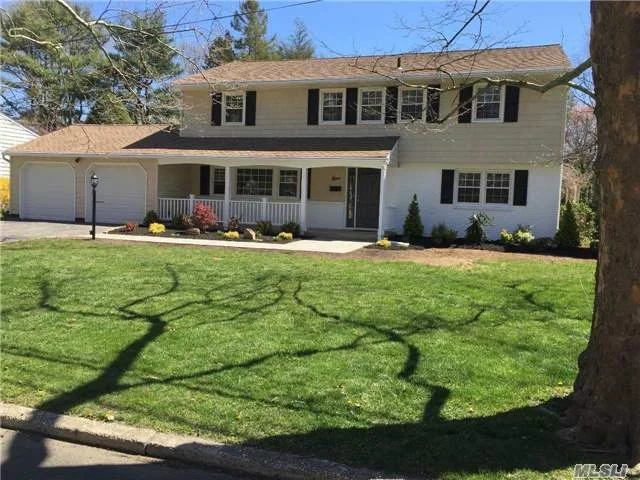 Stunning Front To Back Colonial, Totally Renovated Top To Bottom In 2016, Everything New - Windows, Electric, Hw, Floors, Baths, Kitchen/Appliances, Barn Doors, Walkway, Landscaping - Too Much To List. Open Floor Plan, Vaulted Ceilings, Gleaming Wood Floors, Tons Of Light, Flat Private Yard, West Neck Area, Close To Transportation, Village And Beach - Gorgeous!