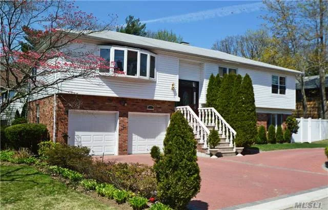 Completely Renovated Hi-Ranch Home In The Village Of Thomaston That Is Close To The Lirr & Town. This Bright And Sunny 4 Bedroom/3 Full Bath Home Features An Oversized Living Room/Fireplace, Master Suite And Hardwood Floors. Can Be A Perfect Mother/Daughter. The Exterior Of The House Features A Fabulous New Brick Circular Driveway And A Spacious Fenced Backyard.