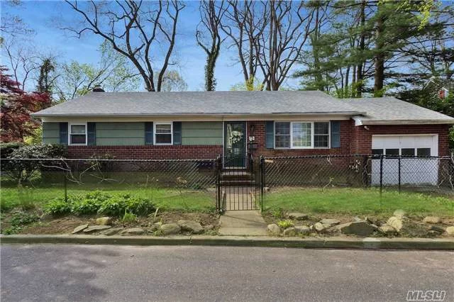 Spacious Brick Ranch On A Quiet Tree-Lined Street Next To The Park. Features Hardwood Floors, Open Layout And Loads Of Privacy. A Blank Slate That Awaits Your Finishing Touch.