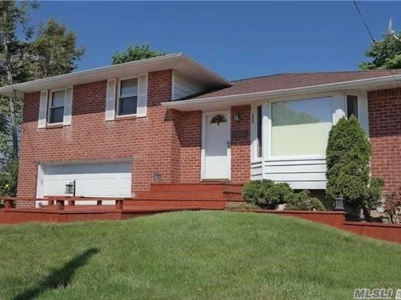 Bright And Spacious Property, Open Layout, Big Lot, Low Tax, Gas Heat & Cooking, Updated Boiler & Garage Door & Driveway, New Roof, New Fence, Updated Kitchen With Quarz Counter Top, Fully Finished Basement With Many Windows, Wood Floor, Wood Deck And Playing Set Is A Gift.