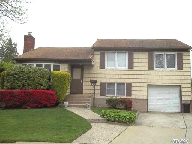 Great Expanded Split..Perfect For Large Family Or Possible M/D W/Permit. Situated In A Cul De Sac On Huge Oversized Property. Home Features Extended Master Bedroom, And Extended Den & Office On The First Floor.. Updated Kitchen, Baths, Heating, Oil Tank, And Wind.. Wood Burning Stove/New Chimney.. Cac/6Yrs .. Large Clean Home.In Quiet Residential Area...Must See!
