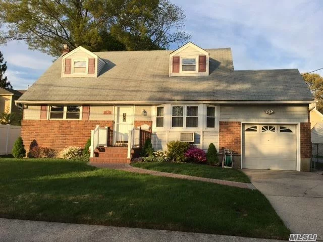 Welcome Home To This Beautiful Cape, Updated Bath, Newer Windows And Siding, Hardwood Floors, Great Property, Near Houses Of Worship And Schools
