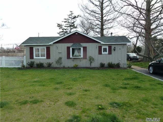 Custom Built Ranch Souht Of Montauk In A Quiet & Charming Residential Area. Some Views Of The Great South Bay. Side Patios & One Area Covered. An Oversized Shed On Property.